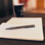 coffee notebook pen writing
